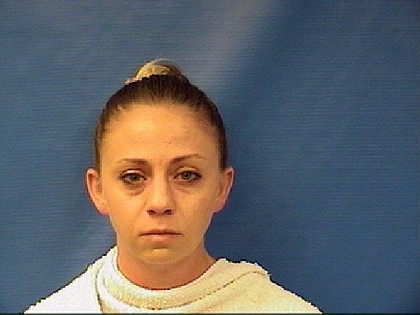 Amber Guyger, who is white, was off-duty when she shot Botham Shem Jean, a black man, police said Thursday.