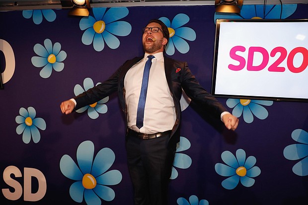 Leader of the far-right Sweden Democrats Jimmie Ãkesson speaks at the party election center on Sunday.
