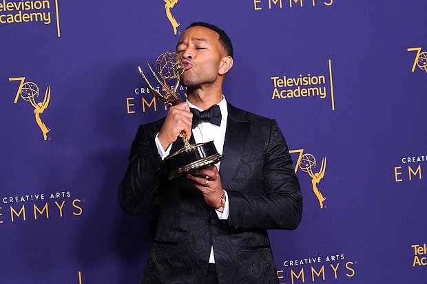 The singer/actor won an Emmy at the Creative Arts Emmy Awards in Los Angeles on Sunday along with Andrew Lloyd Webber and Tim Rice for producing the best variety special winner, "Jesus Christ Superstar Live in Concert."