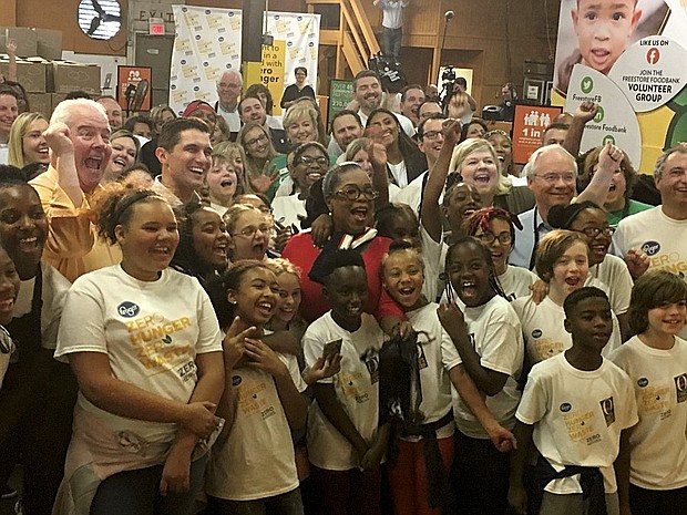 Oprah Winfrey will help volunteers pack meals for school children on Tuesday.