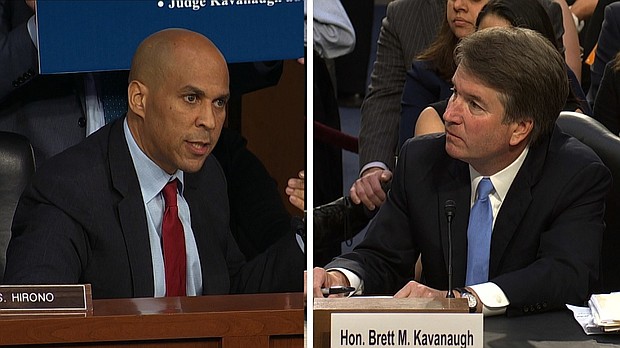 Cory Booker (L) & Brett Kavanaugh (R)