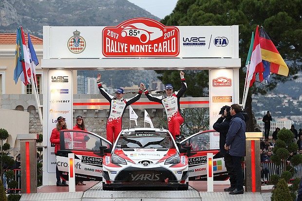 Latvala and Anttila celebrate second place at Monte Carlo.