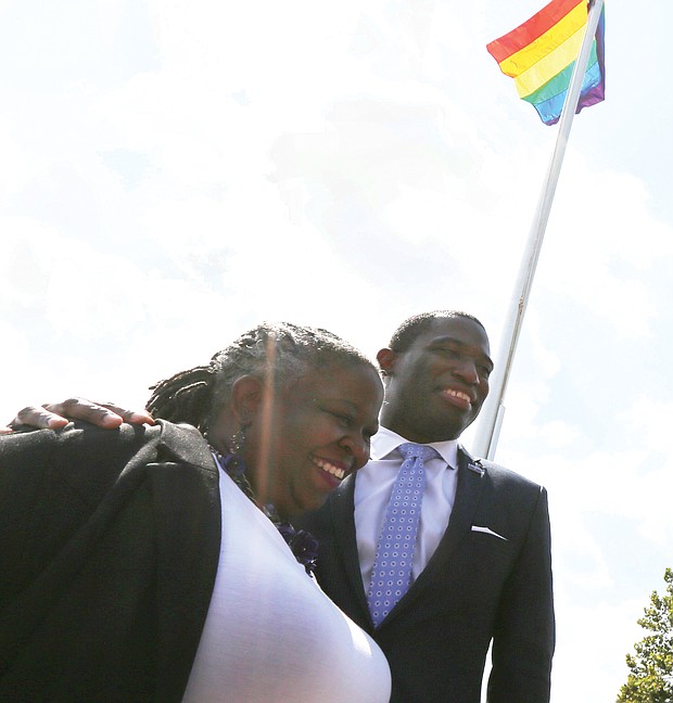 Mayor Levar M. Stoney joins Lacette Cross, co-founder of Black Pride RVA, in celebrating Virginia Pride Week as the rainbow flag flies above them on Brown’s Island. Wednesday’s ceremony raising the banner of the LGBTQ community took place ahead of the popular VA PrideFest scheduled for 11 a.m. to 9 p.m. Saturday, Sept. 22, on the Downtown riverfront island.