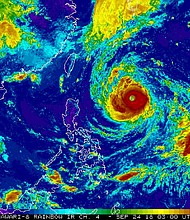 NOAA-released image shows Typhoon Trami gaining strength in the West Pacific. It is expected to reach Super Typhoon size before hitting Taiwan.