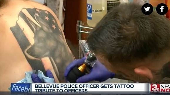 A Bellevue Police Officer who worked with a K-9 officer for two years tattooed a picture of her furry colleague …