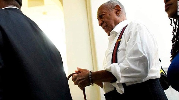 Bill Cosby in handcuffs going to jail for sexual assault