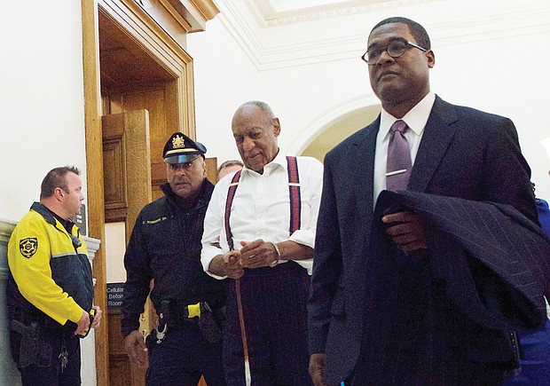 Actor and comedian Bill Cosby leaves a Montgomery County courtroom in Pennsylvania in handcuffs after being sentenced Tuesday for drugging and sexually assaulting a woman at his suburban Philadelphia home in 2004.