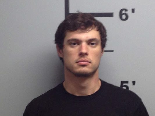 The son of U.S. Rep. Steve Womack, R.-Ark., was arrested Thursday (Sept. 27) on 11 charges, including several related to drugs and firearms.