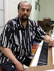 Larry Bland is in practice mode as he prepares for the first of his final concerts as director of The Volunteer Choir, which is marking its 50th year. Location: The choir’s rehearsal room at Second Baptist Church on Idlewood Avenue, where the choir was started in 1968.