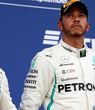 Lewis Hamilton led a Mercedes one-two in the Russian Grand Prix to extend his title lead to 50 points after teammate and pole sitter Valtteri Bottas was ordered to let him pass just over halfway through Sunday's race in Sochi.