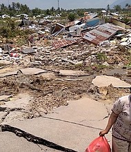 	As rescue workers comb through chunks of concrete and lumber searching for survivors, Indonesian officials say that 832 people were killed in a powerful earthquake and tsunami on the island of Sulawesi.