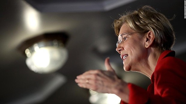 Massachusetts Sen. Elizabeth Warren pledged on Saturday to "take a hard look" at a presidential run in 2020 after the midterm elections are over.