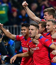 	CSKA Moscow's Croatian midfielder Nikola Vlasic (C) celebrates with his teammates after scoring against Real.