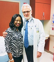 Shawntell and Oncologist Dr. Daniel Booser 