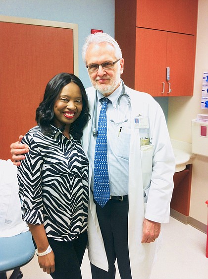 Shawntell and Oncologist Dr. Daniel Booser 