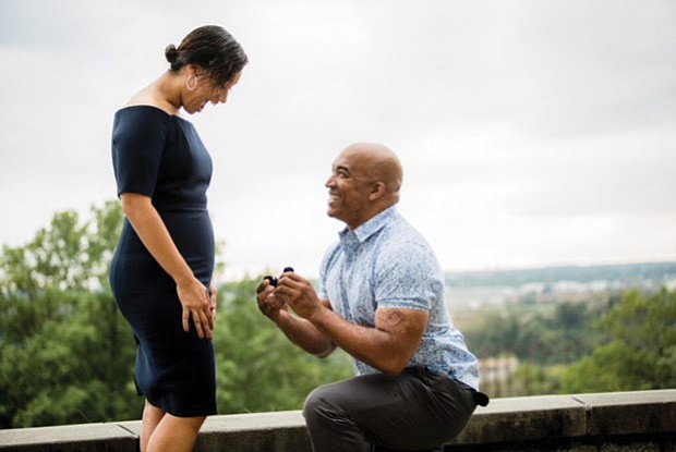 Richmond City Councilman Michael J. Jones gets down on one knee Sept. 22 to ask June Cober to marry him. Location: Chimborazo Park.  