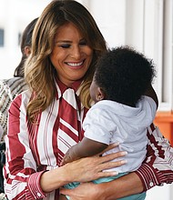 First Lady Melania Trump made a new friend during her visit Tuesday to Greater Accra Regional Hospital in Ghana. Mrs. Trump is on a five-day, four-country tour in Africa, her first solo international trip to focusing on the well-being of children.