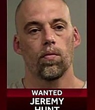  An escaped inmate has been captured in Louisville, KY but another remains on the loose.