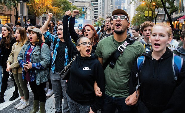 Demonstrators close down Chicago’s Michigan Avenue on Oct. 5 after a jury convicted former Chicago Police Officer Jason Van Dyke of second degree murder in the 2014 shooting death of Laquan McDonald.