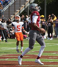 Virginia Union University quarterback Darius Taylor takes the ball into the end zone to score for the Panthers in the record-setting 90-0 homecoming game against Lincoln University of Pennsylvania.