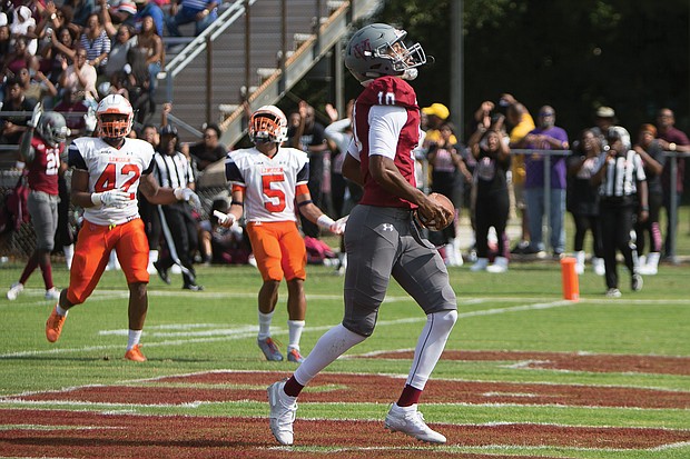 Virginia Union University quarterback Darius Taylor takes the ball into the end zone to score for the Panthers in the record-setting 90-0 homecoming game against Lincoln University of Pennsylvania.