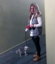 A white woman has been fired after video emerged of her confronting and blocking the entry of a black neighbor at a St. Louis apartment complex.