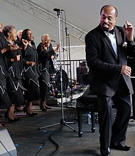 Larry Bland and the Volunteer Choir provide a performance to remember last Sunday, the Richmond Folk Festival’s final day. (Sandra Sellars/Richmond Free Press)
