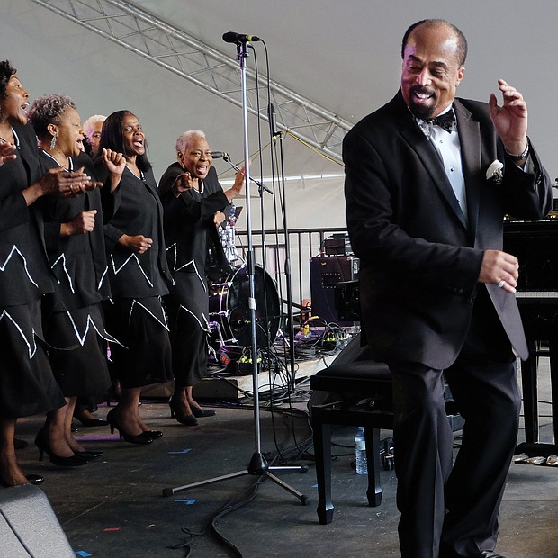 Larry Bland and the Volunteer Choir provide a performance to remember last Sunday, the Richmond Folk Festival’s final day. (Sandra Sellars/Richmond Free Press)