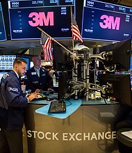 Shares of Caterpillar and 3M were each down nearly 10% in mid-morning trading -- and that was a big reason why the Dow plunged more than 500 points.  CREDIT: Michael Nagle/Bloomberg via Getty Images