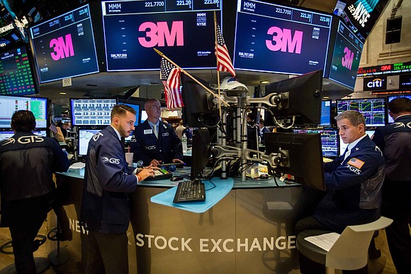Weak outlooks from a pair of industrial giants sent stocks into a tailspin Tuesday. Shares of Caterpillar (CAT) and 3M …