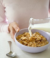 	Dozens of common breakfast cereals and snack bars have trace amounts of a controversial herbicide found in the weed killer Roundup, according to a report released today by an environmental advocacy group.