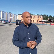 Richmond City Councilman Michael J. Jones stands in front of the Southside Community Center on Old Warwick Road as he talks up his plan to rename the 18-acre city property for Lonnie Battle, a popular local DJ known professionally as DJ Lonnie B.