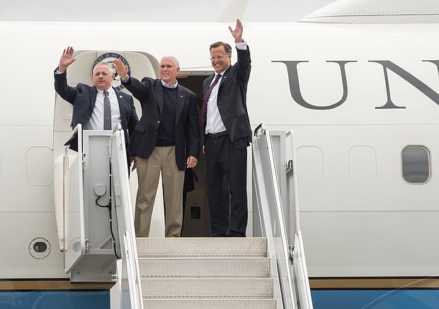 Vice President Mike Pence arrives at Richmond International Airport last Saturday on Air Force One to campaign for several Virginia Republican congressional candidates, including 7th District Rep. Dave Brat, right, who is facing a close challenge from Democrat Abigail Spanberger, a former CIA operative. The vice president also attended a Downtown rally and private fundraiser for Ryan McAdams, an evangelical pastor who is challenging Democratic incumbent Rep. A. Donald McEachin in the 4th Congressional District.