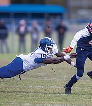 Virginia State University’s Jemourri La Pierre gets past Chowan University’s Attwuan Hicks during last Saturday’s game at Rogers Stadium in Ettrick. VSU lost the game 45-38.