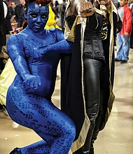 Superheroes, unite! Scores of people dressed as their favorite comic book heroes and heroines for the 2018 VA Comicon, a two-day extravaganza for comic book fans and lovers of comic book culture. Thousands flocked to the event at the Richmond Raceway last Saturday and Sunday that featured a costume contest both days. Tikki Wynn is head to toe in blue as “Mystique” and Honey Hall becomes “Storm,” all Marvel Comics characters. (Sandra Sellars/Richmond Free Press)