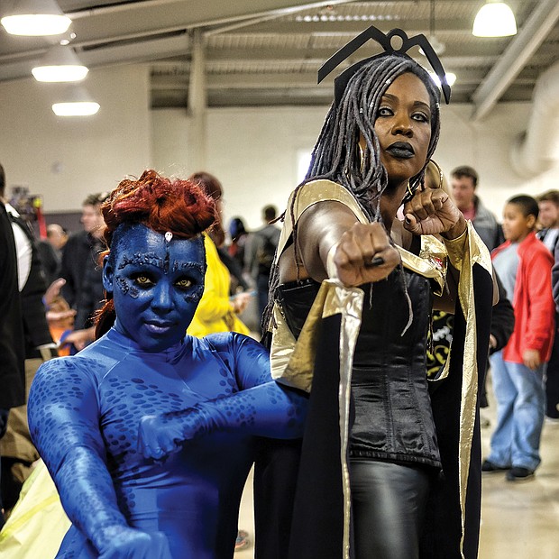 Superheroes, unite! Scores of people dressed as their favorite comic book heroes and heroines for the 2018 VA Comicon, a two-day extravaganza for comic book fans and lovers of comic book culture. Thousands flocked to the event at the Richmond Raceway last Saturday and Sunday that featured a costume contest both days. Tikki Wynn is head to toe in blue as “Mystique” and Honey Hall becomes “Storm,” all Marvel Comics characters. (Sandra Sellars/Richmond Free Press)