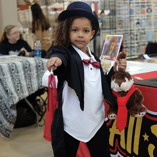 I put a spell on you: Wands, rabbits and other tricks are just the tip of the iceberg for Violette Brown. No, she wasn’t dressed for Halloween. She was dressed for 2018 VA Comicon, a two-day event held last weekend at the Richmond Raceway. (Sandra Sellars/Richmond Free Press)