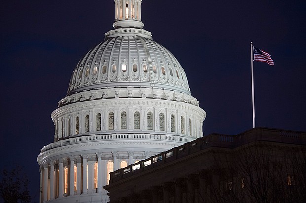The US Capitol Building is seen at dusk in Washington, DC, February 6, 2018.