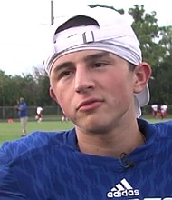 It's is the first time Miles Levine has his shoulder pads on in a while. No helmet or football pants. He's wearing his number 9 home blue with white letting Spanish River High School jersey.