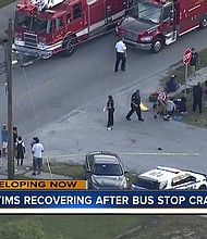 Father demands answers after driver hits his daughters at Tampa bus stop.