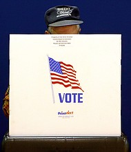 A voter fills out a ballot at a polling place in Pasadena, Maryland, on Tuesday, November 6, 2018.