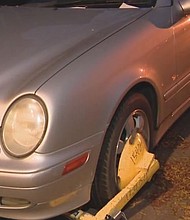 An Englewood driver booted five times this week alone has racked up nearly $8,000 in parking ticket debt with the City of Chicago, and he says he can't pay the tab.