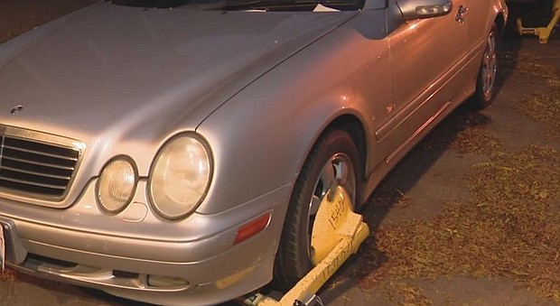 An Englewood driver booted five times this week alone has racked up nearly $8,000 in parking ticket debt with the City of Chicago, and he says he can't pay the tab.