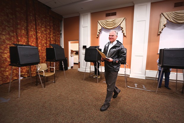 After marking his ballot, U.S. Sen. Tim Kaine of Richmond heads to the machine to cast his vote at Precinct 203 inside The Hermitage Richmond continuing care retirement community on Westwood Avenue in North Side. He and has wife, Anne Holton, have voted at the precinct for the last 28 years. The Democrat easily won re-election over GOP challenger Corey Stewart.