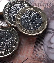 The British pound dropped sharply on Thursday after two key UK government ministers resigned, plunging the Brexit process into deep uncertainty and hiking the risk of a chaotic rupture with the European Union.