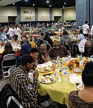 Thousands of people enjoy last year’s Thanksgiving feast put on by The Giving Heart at the Greater Richmond Convention Center that is open to the Richmond community.