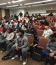 Members of the Virginia Union University football team wait last Sunday to hear the team’s name called for a berth in the NCAA regional playoffs. Despite an 8-2 record, the Panthers were disappointed and missed the cut.