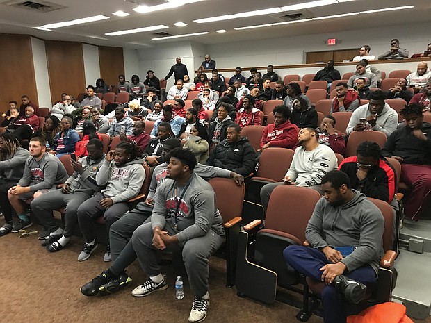 Members of the Virginia Union University football team wait last Sunday to hear the team’s name called for a berth in the NCAA regional playoffs. Despite an 8-2 record, the Panthers were disappointed and missed the cut.
