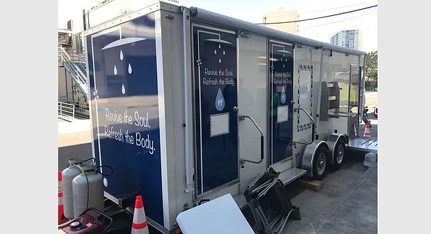 Couple launches new mobile shower service as community service