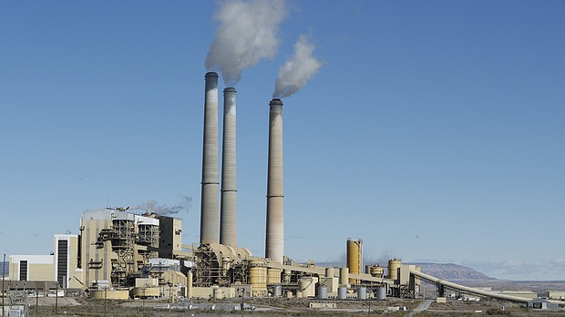 Emissions rise from the smokestacks of Pacificorp's 1440-megawatt coal-fired power plant on October 9, 2017, in Castle Dale, Utah.